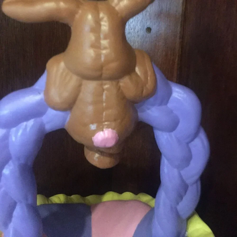Ceramic Easter bunny hanging from basket